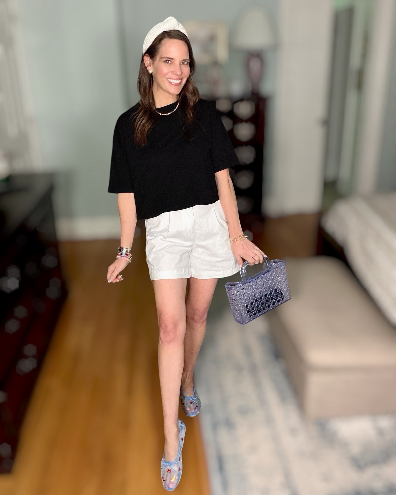 Effortless Summer Outfit 🤍 Boxy Black Tee + White Shorts + Colorful Accessories


This boxy crop tee is the definition of an elevated basic 🖤 Made from 100% organic cotton and crafted in the USA, it has that perfect heavyweight feel while still being breathable for warmer days. I love the relaxed, slightly cropped fit—it pairs so effortlessly with high-waisted shorts for a clean, flattering silhouette.

Styled it here with classic white shorts for a crisp summer look 🤍 and added a pop of personality with colorful beaded jewelry and the cutest mesh ballet flats 💙 The sheer blue flats with embroidered details are such a fun statement piece and surprisingly easy to wear! Finished it off with a mini jelly tote for that playful, coastal vibe 🐚

This is one of those outfits you can throw on and instantly look polished but still feel completely comfortable—perfect for everyday errands, lunch, or casual summer plans ☀️

summer outfit ideas, boxy crop tee outfit, organic cotton t shirt made in usa, black tee outfit women, white shorts outfit summer, casual chic summer style, preppy summer outfit, colorful jewelry stack, beaded bracelet trend, mesh ballet flats outfit, jelly tote bag outfit, effortless everyday style, elevated basics outfit

#LTKOver40 #LTKPetite #LTKSaleAlert