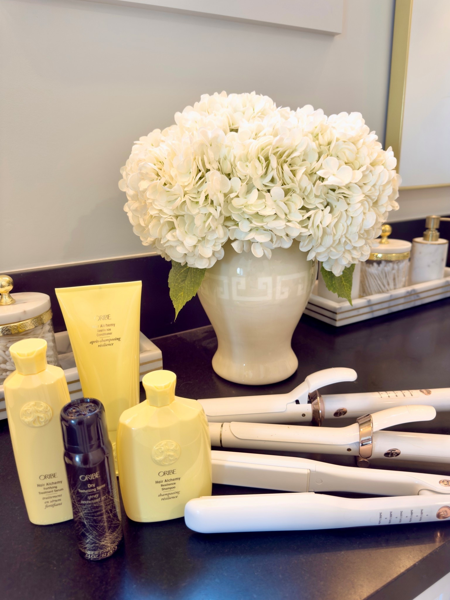 Favorite hair products I use. 
My T3 curling irons and flat iron are 30% off right now!  I use both the 1 inch and the 1.25 inch. I also have the 1 inch flat iron. 

I love Oribe hair care & have both the Alchemy and the Gold Lust lines - shampoo and conditioner.
The texturizing spray gives you so much volume - I love it! 🤍

#LTKBeauty #LTKSaleAlert