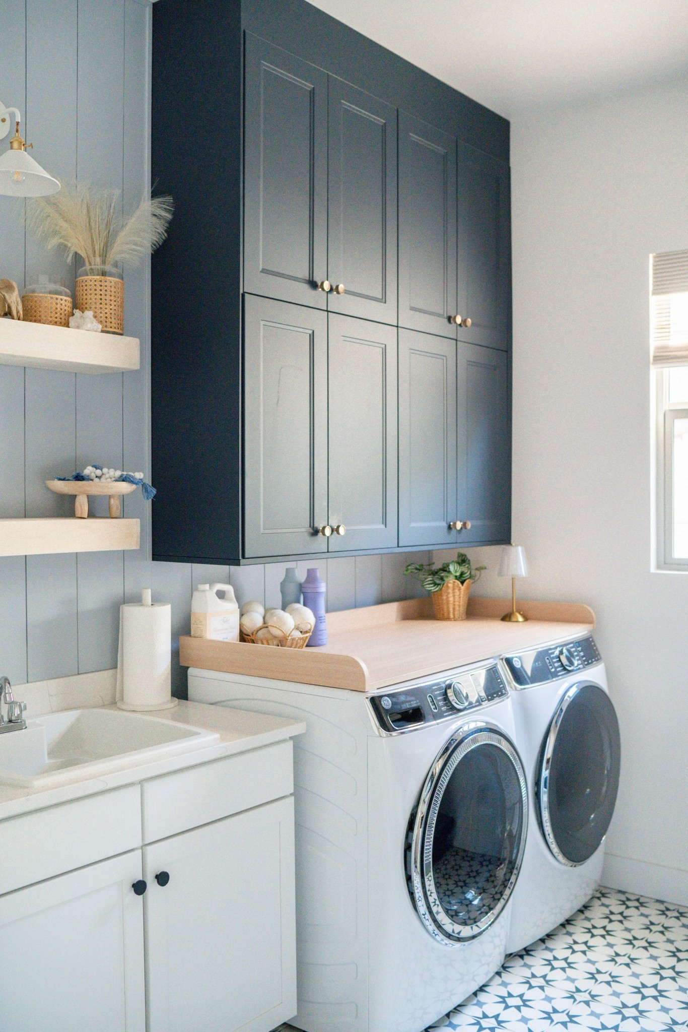 Absolutely obsessed with our washer/dryer countertop! It’s currently 21% off and it really makes our space look complete. It gives an extra space for storage without looking cluttered and a place to fold clothes! Amazon home, Amazon decor, laundry room, laundry room decor, home organization 

#LTKHome