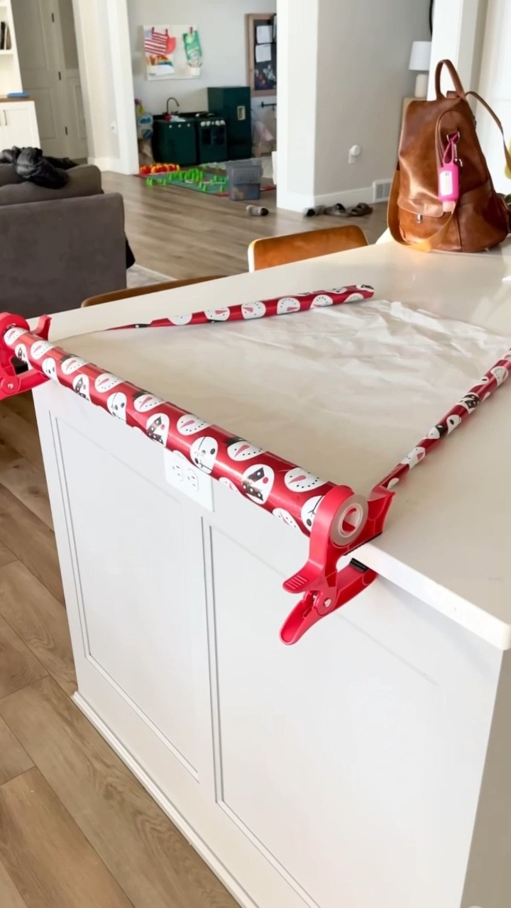 Have you heard of the wrap buddies?! Freaking genius! Helps ease most of the frustrations with wrapping. I used to be a floor wrapper, but due to pain, can't get on the floor anymore! This makes Christmas (and all) wrapping a breeze! Clips to most hard surfaces. 

#LTKSeasonal #LTKGiftGuide #LTKHoliday