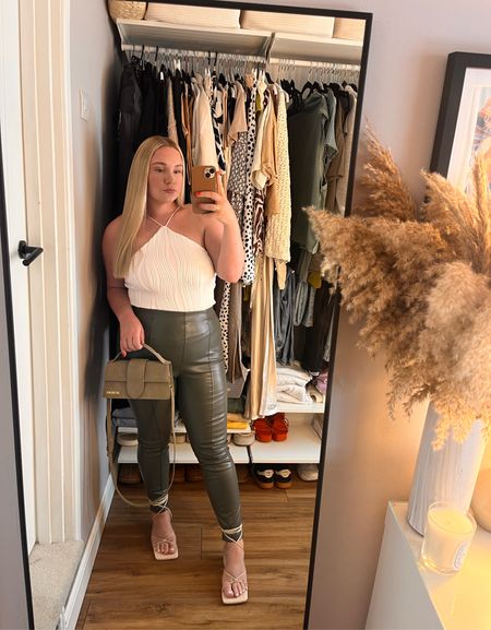 Girls lunch fit.
Faux leather trousers paired with a little crop top tucked in and some cute beige heels. 

#LTKstyletip #LTKFind #LTKcurves
