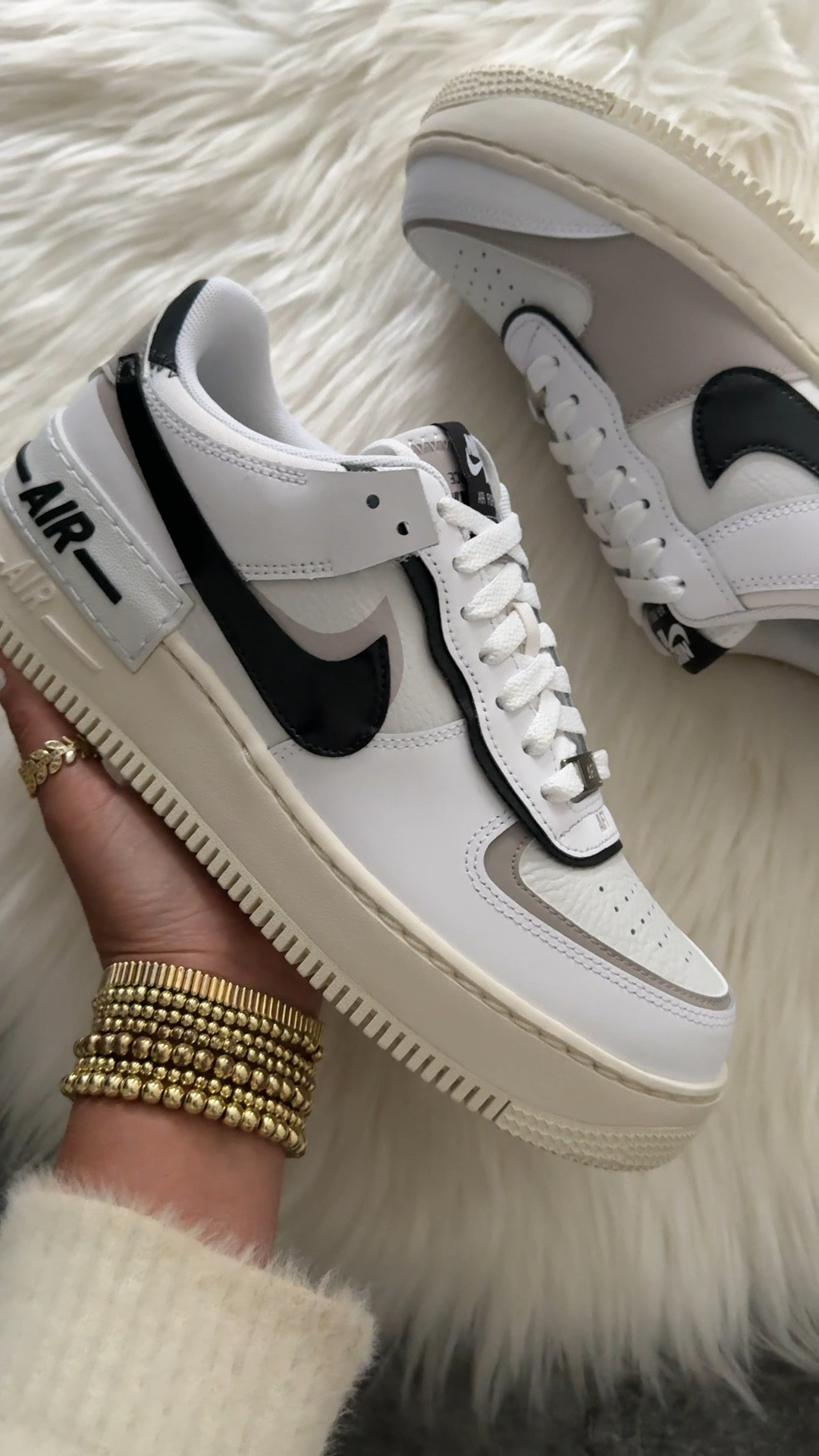 Nike Air Force 1 shadow sneakers fit small. Go up a half size when ordering 