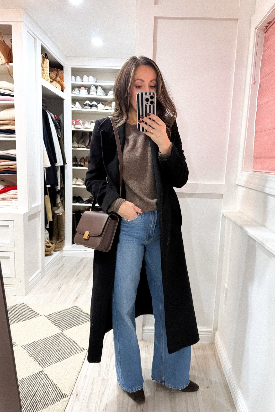 Sweater tts but I sized up to Medium for a looser fit. 
Booties tts - I sized up 1/2 for my toe room/slightly thicker socks.  
Jeans in size H&M size 8 (I’m usually size 26). These fit like size 27 which I wanted - roomier fit (I’m 5’6). Linking a similar pair that comes in different lengths.  
Coat is old Ralph Lauren.  Linking similarly timeless options. 
Bag - can’t get enough!! 

#LTKShoeCrush #LTKItBag #LTKStyleTip