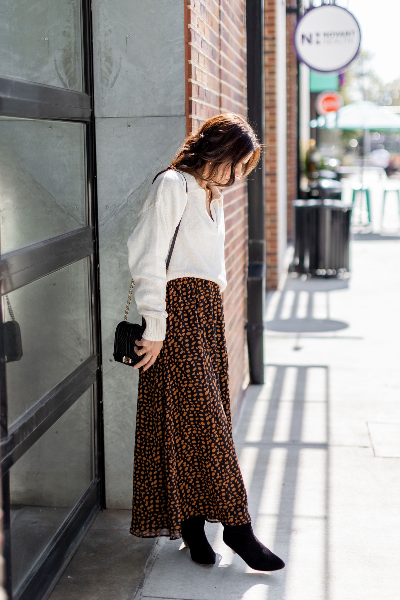 Fall capsule outfit idea: layer your polo sweater over the top to give the illusion of a skirt. Complete with boots for a chic fit. #datenightoutfit 

#LTKSeasonal #LTKstyletip