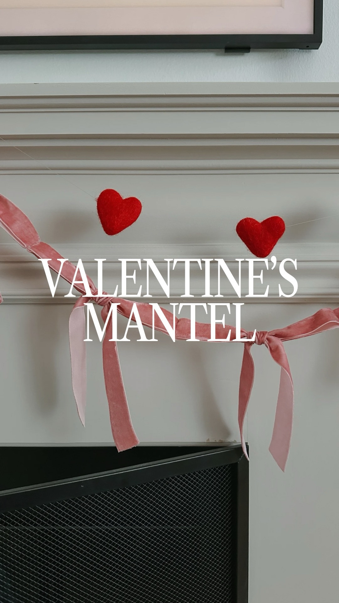 Wool heart garland layered with DIY pink velvet bow garland. Glossy red and white spiral candles, love Frame TV art and coffee table books. 

#LTKcanada #LTKcasa