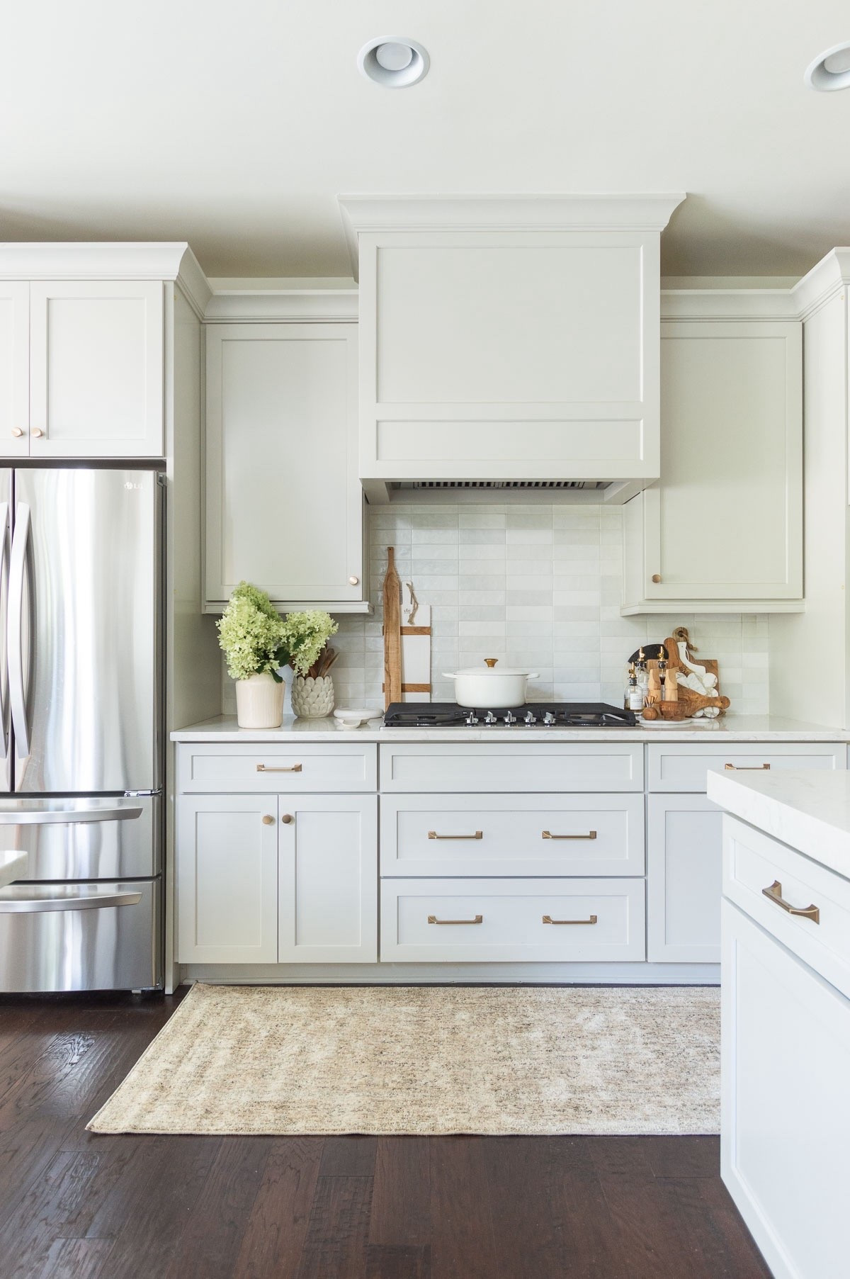 One of the best ways to provide an easy and affordable update to your home as the seasons change is switching out your kitchen runner. My new neutral kitchen runner is a great value, available in a ton of sizes and will hide spills, stains and imperfections well. home decor kitchen decor fall decor white backsplash tile agreeable gray cabinets Wayfair find

#LTKStyleTip 

#LTKHome #LTKSeasonal