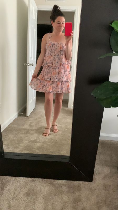 HONEST review of the Loella Floral Print Pleated Tiered One-Shoulder Minidress dress from Petal and Pup. 
OK, so initially, I had some trouble trying to figure out how to put on this dress. The straps are a little difficult to figure out but once you realize it’s a one shoulder dress it’s easy to tie. The pros are it’s a very, very comfortable dress almost feels like pajamas. There is a ton of room throughout the waist and bum. This dress is perfect. If you are newly pregnant, trying to hide a bump or just looking for extra comfort for your next event it hides all the imperfections. It’s a perfect price point under $100. The material and pattern is very high end I could see this as a perfect Mother’s Day brunch Dress, graduation dress, bridal shower, dress baby shower dress or a fancy dress for summer you don’t have to worry about the length. It fits perfectly above the knee and I am 5 foot I can wear low heels, sandals or high sandals run this before it sell out, it’s an excellent choice to have in your closet.

#LTKfindsunder100 #LTKtravel #LTKstyletip