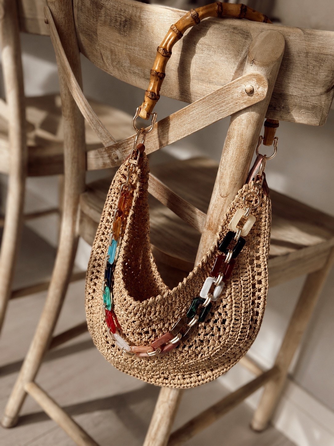 Obsessed with her! And the chain you can remove! Look at the handle!!! 😍
 
Raffia. Vacation outfit. Bags.

#LTKSeasonal