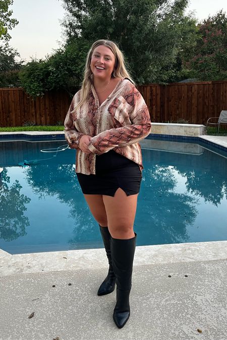 Fall date night outfit idea — black mini skirt (skort) is TTS and I have it in “tall”. The snakeskin long sleeve blouse is old, so I’ll link similar tops. The black knee high boots are from Torrid and can’t be linked, but I have similar ones that are wide calf knee high boots linked here  

#LTKcurves #LTKstyletip #LTKSeasonal