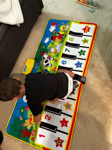 Baby toddler piano play mat with music. My toddler aid almost 2 and he’s now showing more interest in this toy! Great Christmas or birthday gift!

#LTKkids #LTKGiftGuide #LTKbaby