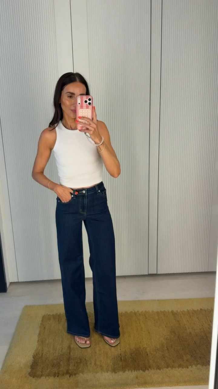 Target jeans, I'm in size 2.

dark wash jeans, wide leg jeans, high rise jeans, fall outfit, casual style, white tank, flat sandals, everyday denim, Target fashion, denim essentials

#LTKootd #LTKOver40