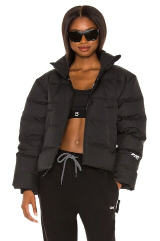 Reebok x Victoria Beckham Cropped Puffer in Black from Revolve.com | Revolve Clothing (Global)