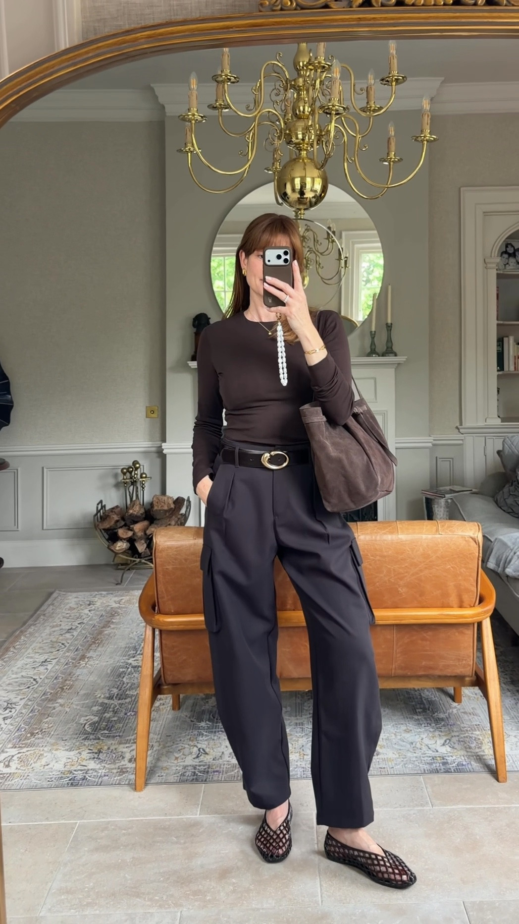 Cargo barrel leg trousers 
Long sleeve t shirt
Jelly ballet flats
Suede bag

#LTKuk #LTKspring #LTKbag