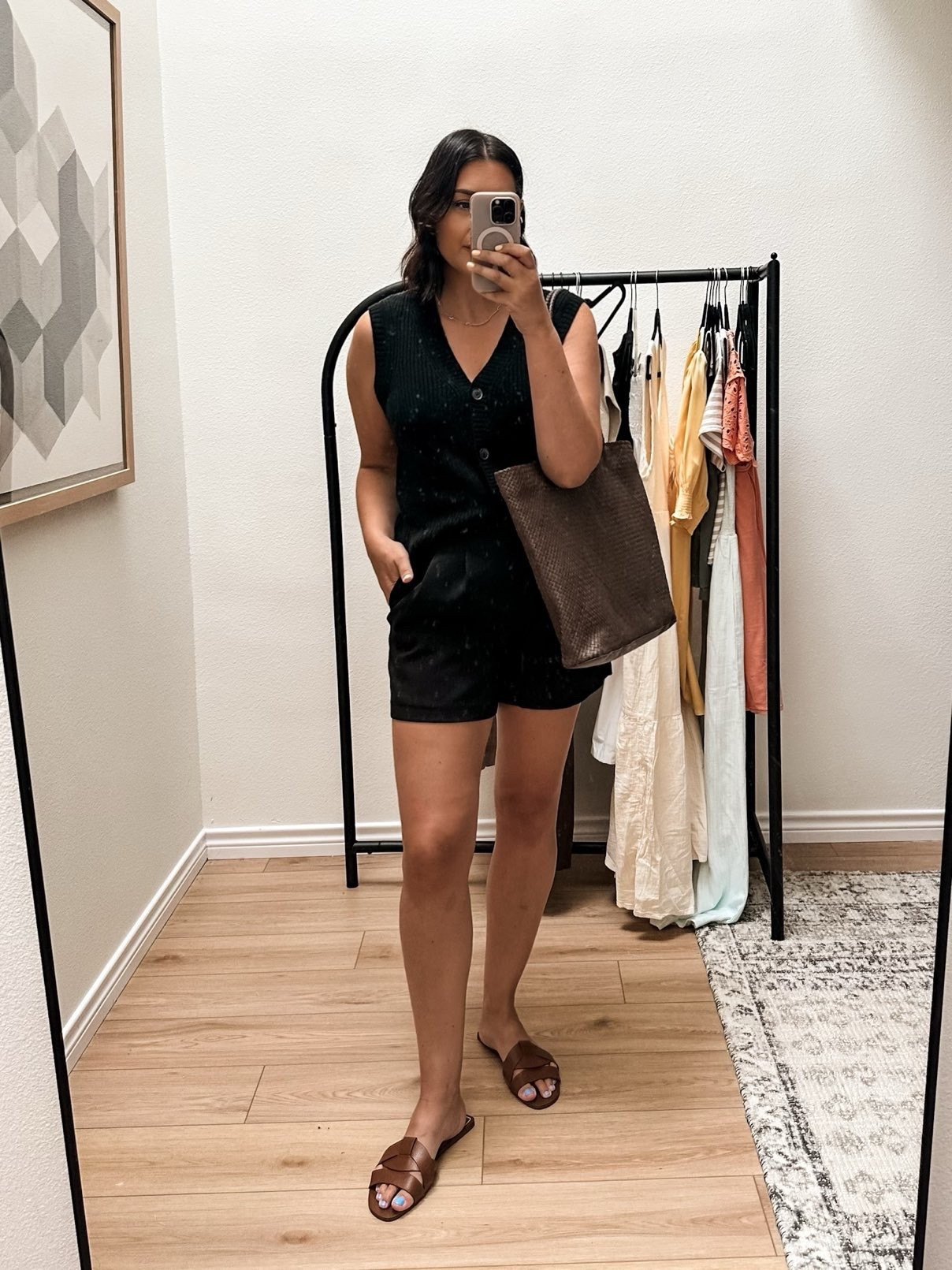 I love how easily this outfit came together and how tailored it is. These shorts have the nicest fit – they’re tailored and pleated and quite comfortable at the same time. However, DO size up! I am in the 10 ( a size up) and they’re still pretty fitted at the waist! The sweater vest however runs generously, I’m in the medium and there is plenty of wiggle room. 

Don’t sleep on this tote either! If you are looking for a BIG leather tote, it’s this one! I can’t believe how roomy this bag is, it’s huge! Can definitely fit a laptop et al, and would be great for travel! If you are looking for a mom bag, you have found it! @onequince #quincepartner