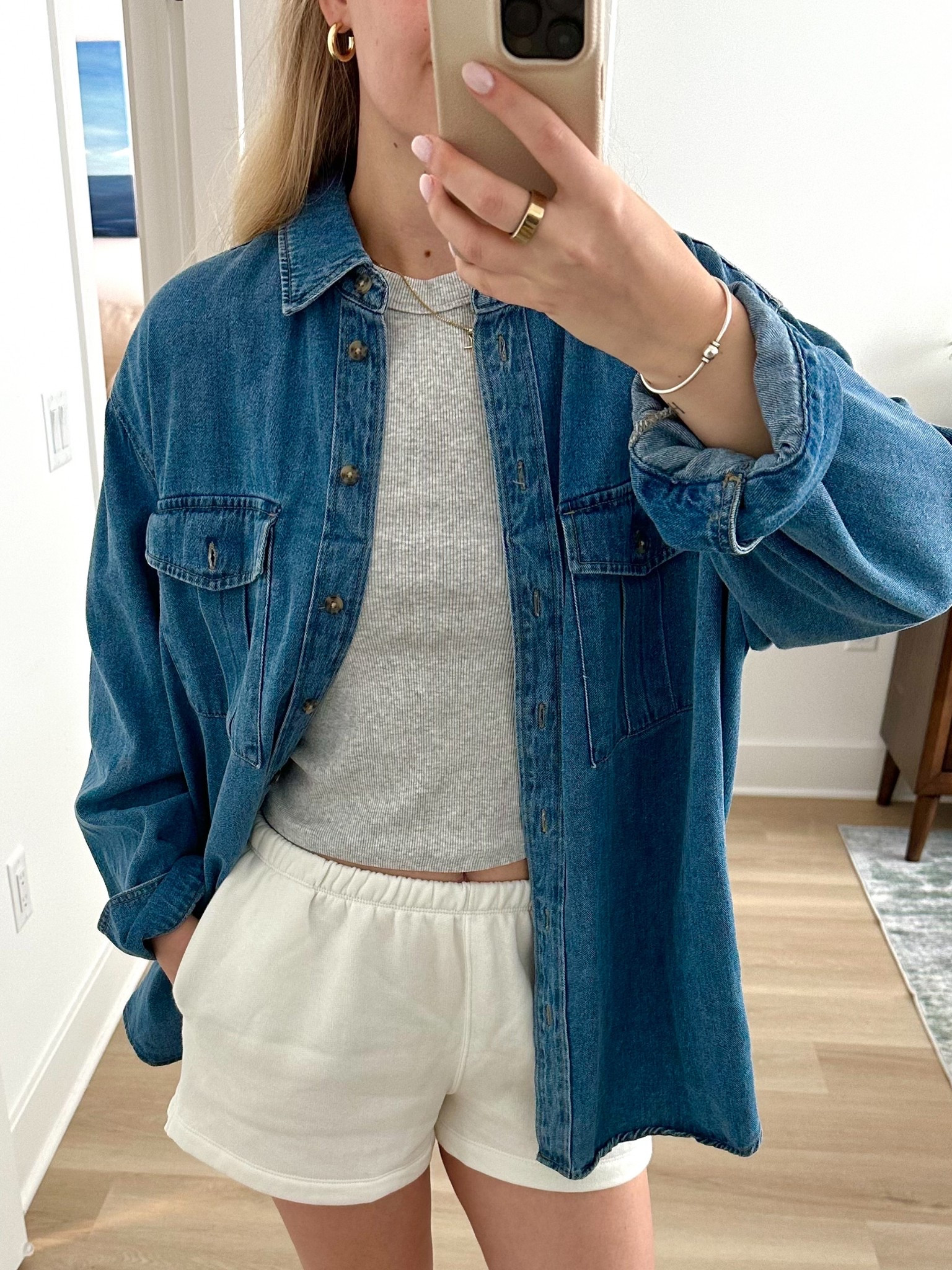A layered denim shirt is my favorite look for this spring & summer — this oversized denim shirt is a medium from Target 

#LTKSummerEdit #LTKSeasonal #LTKStyleTip