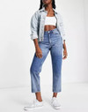 Click for more info about Monki Taiki mom jeans with patches in blue