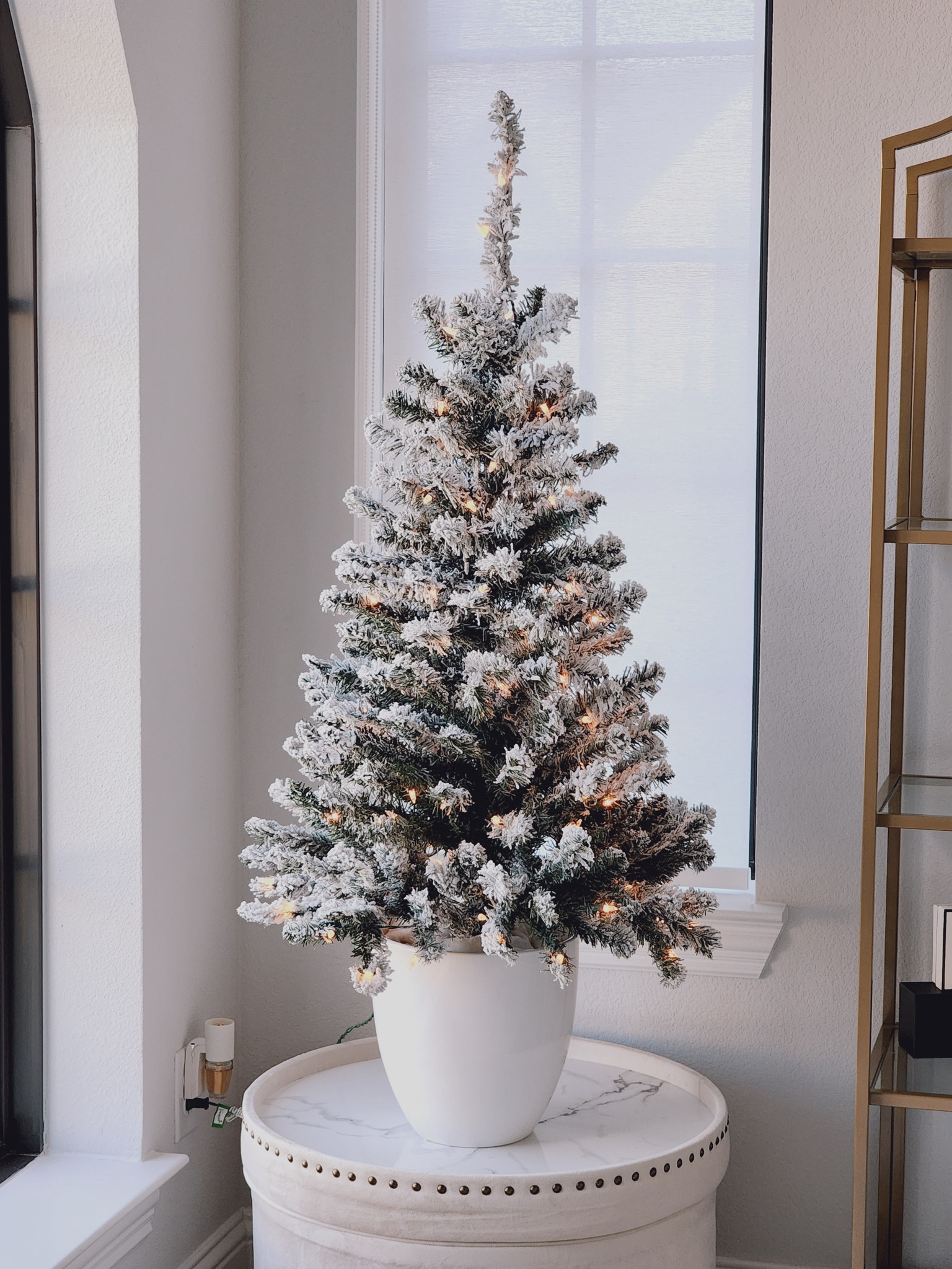 3’ pre-lit flocked Christmas tree under $30. Added the tree in this planter pot to elevate the look. 
I used this in my home office but would look great next to a fireplace, front porches/patios, kids rooms or even in a window seat/nook. 


#LTKHoliday #LTKSeasonal #LTKhome