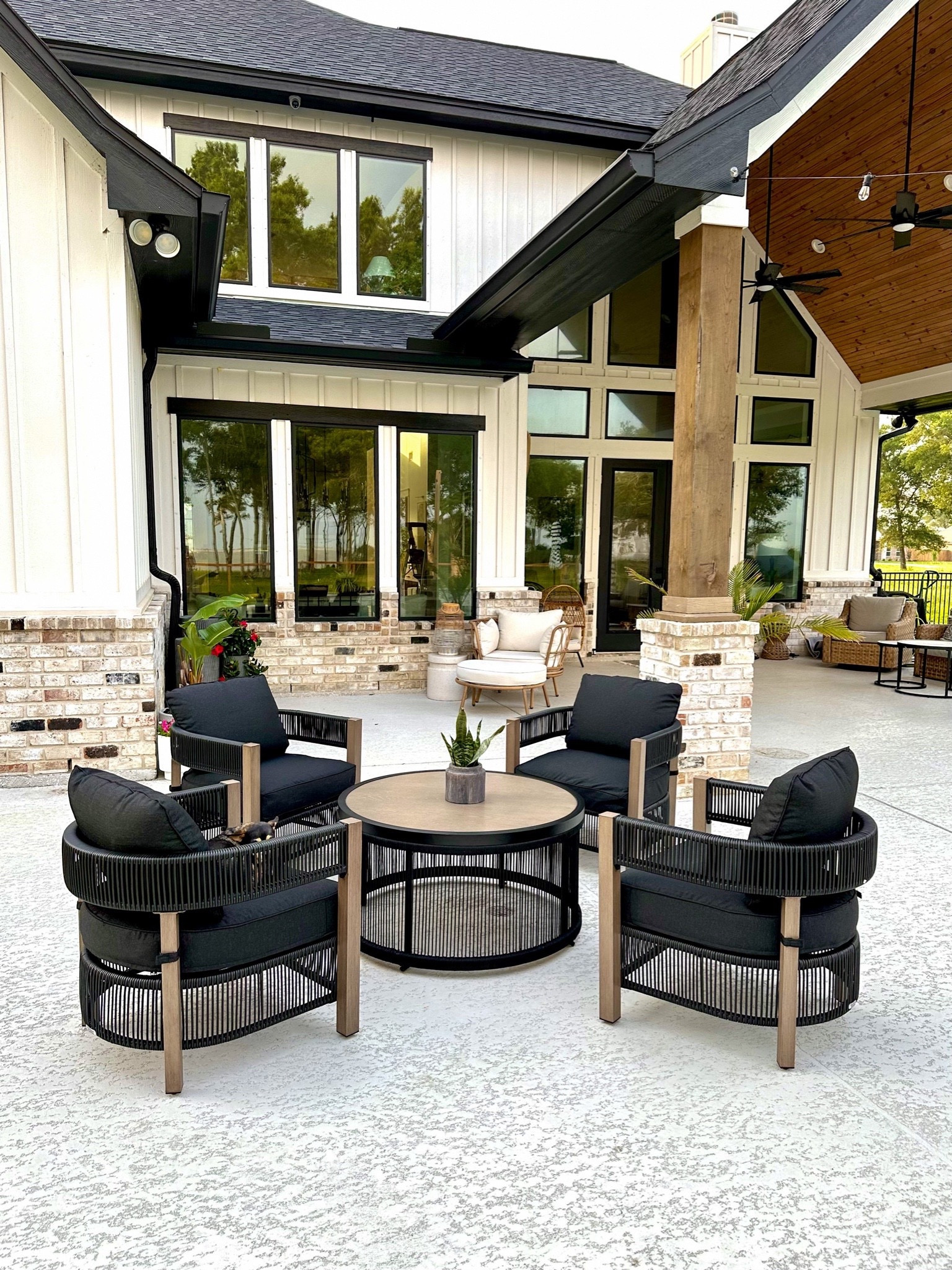 This Walmart patio set is all the modern vibes I could have imagined. Had it a year and hasn’t faded or rusted. #walmartoutdooroasis #patioset #outdoorset #outdoorfurniture #patiofurniture 

Summer, summer finds, summer favorites, summer porch, summer decor, summer outdoor inspiration, outdoor decor, porch finds, porch favorites, porch inspiration, porch decor, porch furniture, black planters, black porch swing, woven hanging planter basket, garden bed with stand, pillar candle lantern, outdoor rug, wicker outdoor lantern, welcome half moon doormat, outdoor door mat, porch wall light, porch sconces, wood stump accent table, throw pillow, outdoor pillow, Modern home decor, modern planter pot, black pot, plant pot, black home decor
Black patio furniture, modern patio furniture, arhaus dupe, crate and barrel dupe, Serena and Lily dupe. 

#LTKhome #LTKSeasonal