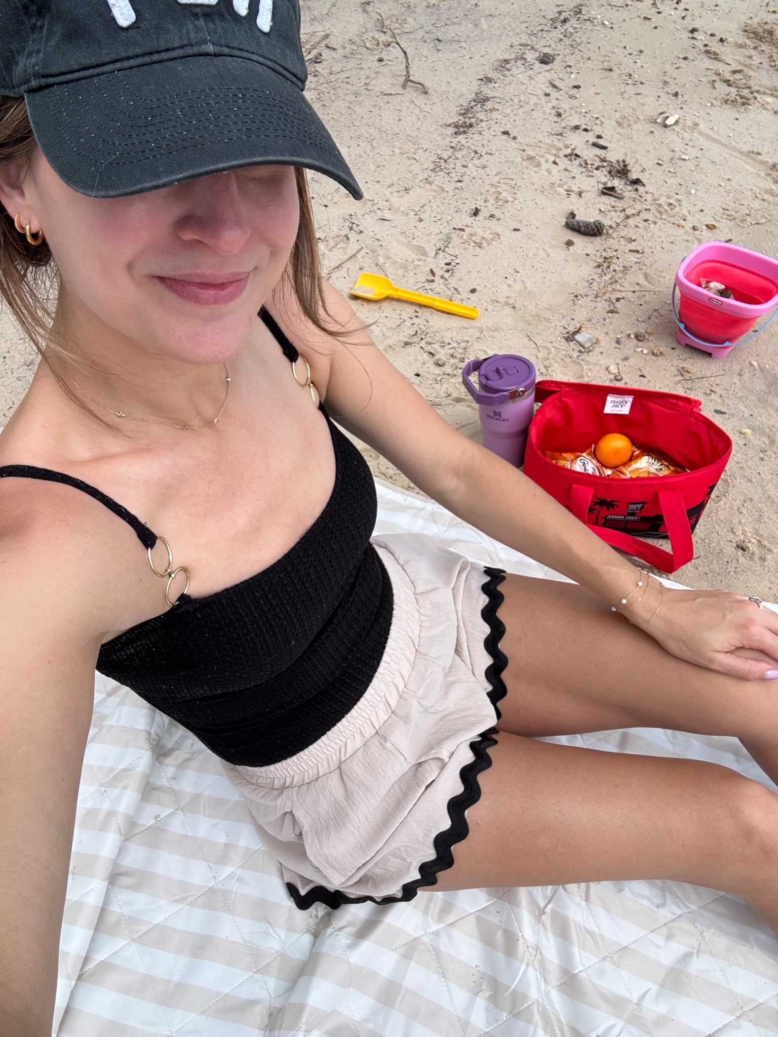 First beach day of the year. Cupshe bathing suit, Amazon shorts and my favorite beach blanket from Walmart!