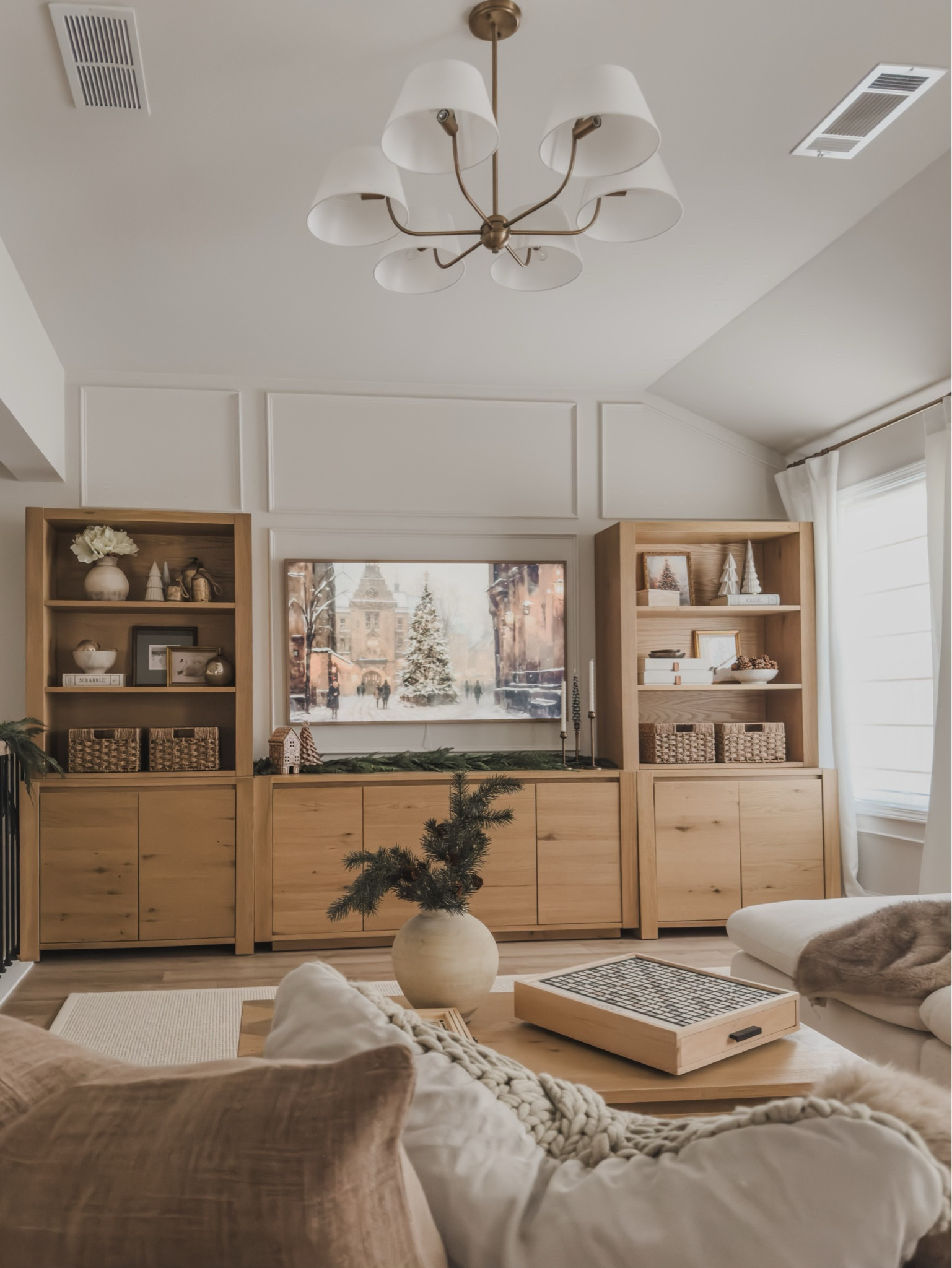 Media center views with holiday shelf styling! Neutral and cozy vibes with neutral wood tones, seasonal decor, and creamy linen details

Home finds, media center, linen curtains, gold accents, Castlery furniture, neutral area rug, Pottery Barn style, neutral wood tones, coffee table faves, neutral board game, shelf styling, neutral home inspo, lighting detail, faux garland, frame tv, Christmas style, holiday frame art, decor trees, faux fur blanket, linen upholstered section, Target style, shop the look!

#LTKHoliday #LTKSeasonal #LTKHome
