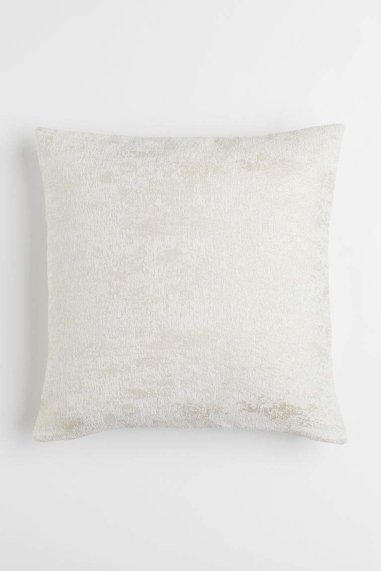 Cushion cover in a jacquard weave with a slight sheen. Concealed zip in one side.CompositionPolye... | H&M (US + CA)