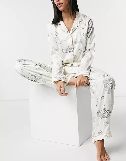 Chelsea Peers sealife printed long sleeved shirt and trousers pyjama set in cream and black | ASOS (Global)