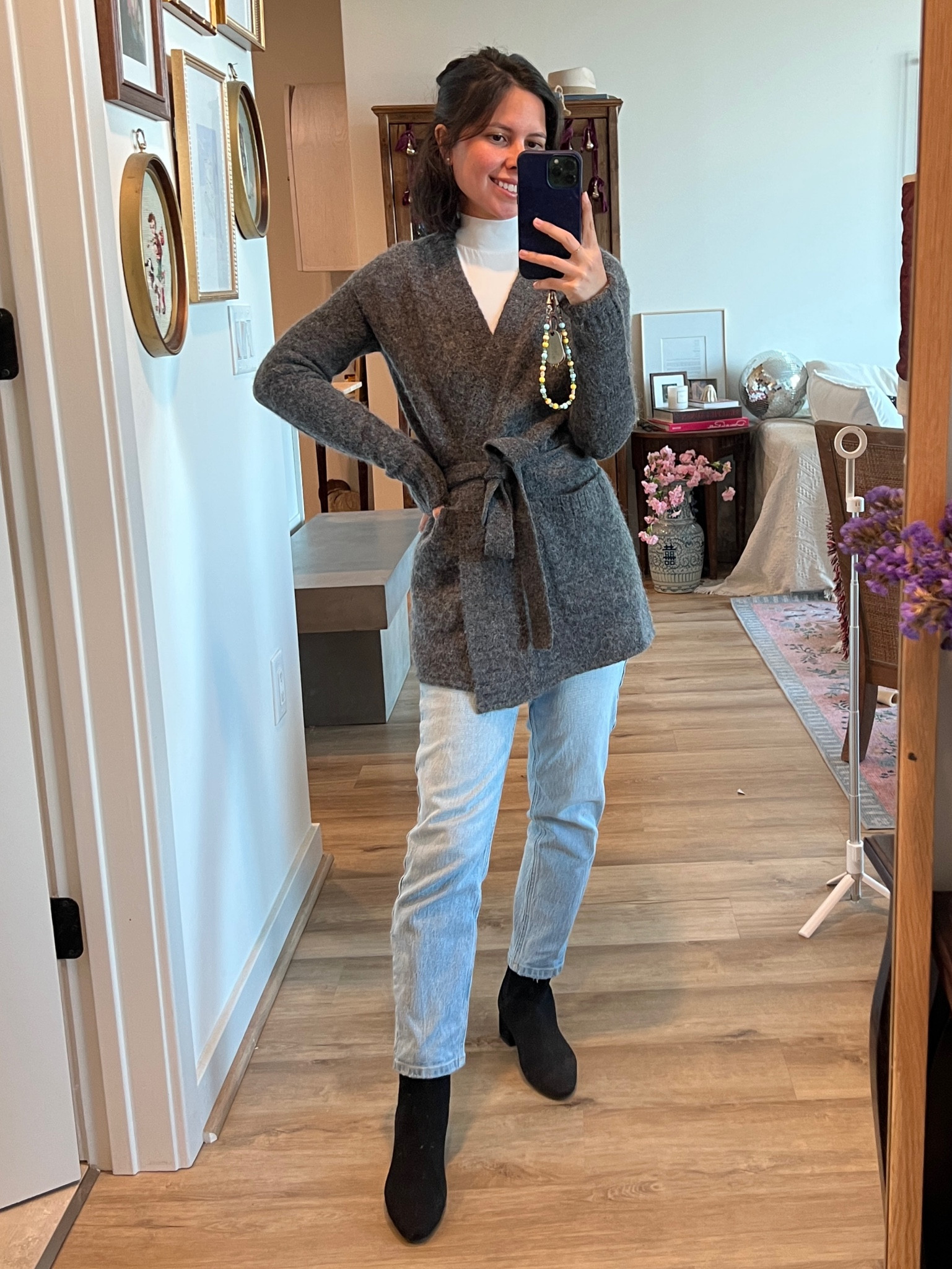 Cozy winter outfit, petite winter outfit, robe cardigan, wrap cardigan, everlane, Rothy’s, black booties, black booties city walking, white longsleeve, white turtleneck 

#LTKStyleTip #LTKFindsUnder100 #LTKSaleAlert