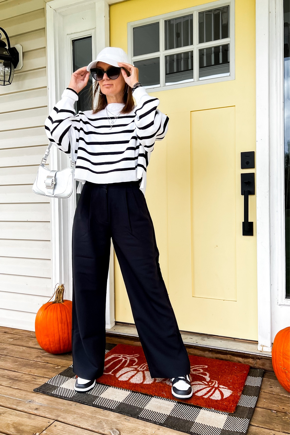 Amazon white and black striped sweater, AF Sloan pants, black pants, Nike Pandas, silver bag, white 47 brand ball cap, Uncommon James silver earrings, Victoria Emerson Silver layered necklace. 

Fall fashion/Fall style/fall look/casual style/petite style/petite girl/everyday fashion/everyday look/sporty outfit 

#LTKfindsunder50 #LTKstyletip #LTKover40