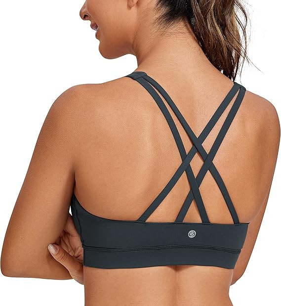 CRZ YOGA Naked Feeling Strappy Padded Sports Bras for Women - Fitness Workout Top Criss Cross Bac... | Amazon (US)