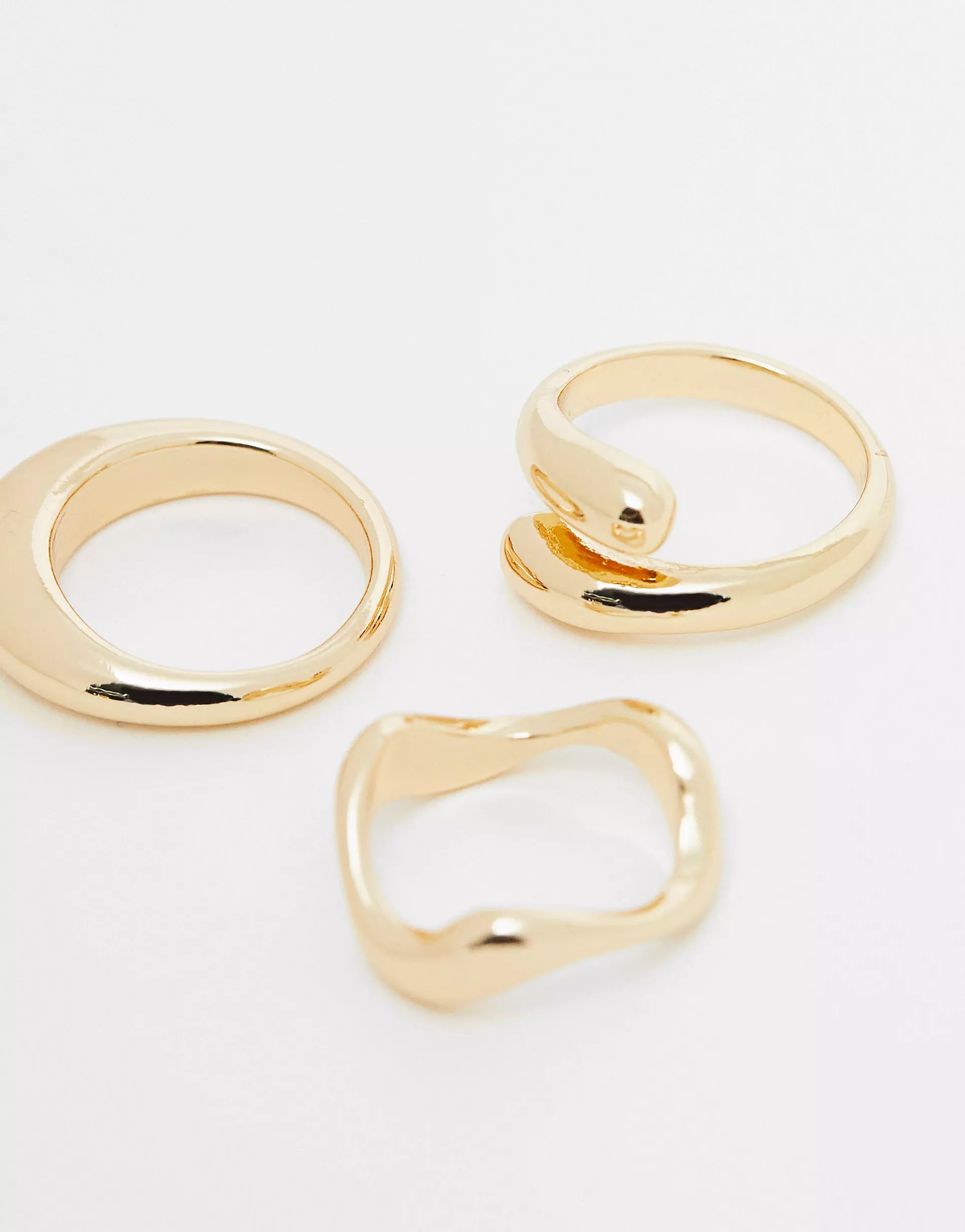 ASOS DESIGN Curve pack of 3 rings with mixed minimal designs in gold tone | ASOS | ASOS (Global)