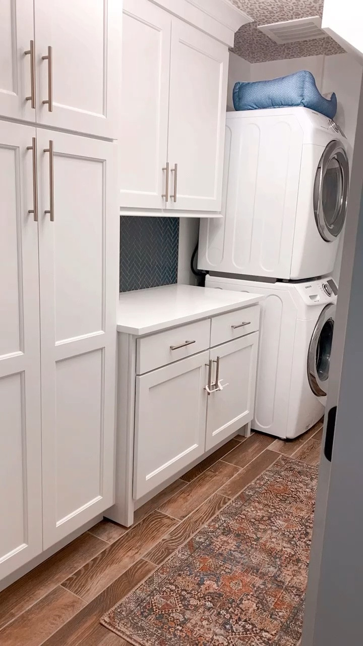 Laundry room tour plus all available links or similar items 
:
Handles, similar rug, tile backsplash, dryer balls, canister, wallpaper, light fixture, gold wall mount clothing hanger all linked #LTKFind #LTKunder50

#LTKhome