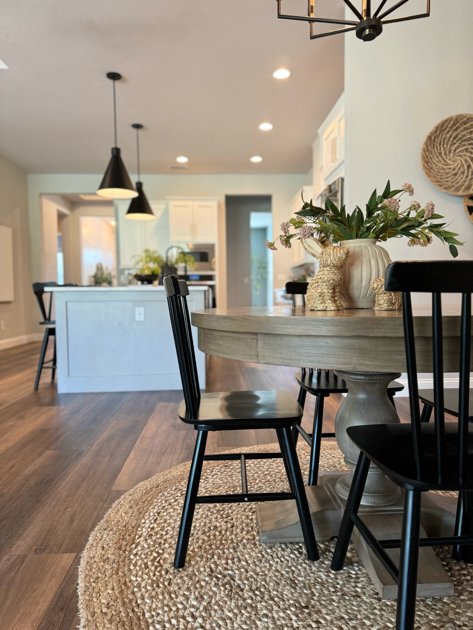 Shop my breakfast nook 
- solid wood spindle chairs
- vase
- spring stems 
- decorative wicker bunnies 

#LTKSeasonal #LTKhome