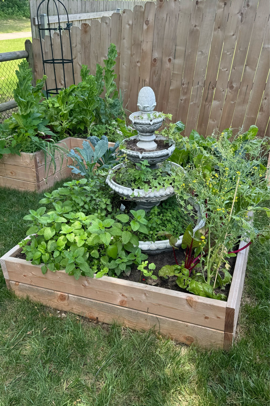 Raised garden bed
European pottager garden
Outdoor fountain herb garden

#LTKhome