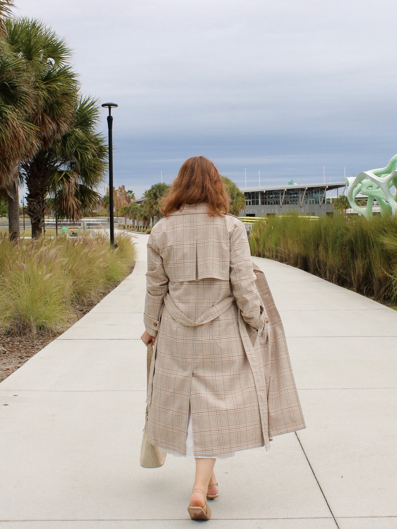 This trench coat is sold out, but linking the exact style in lighter colors, a pinstripe version, as well as a similar one. 

Pinstripe trench coat. Spring trench coat. 