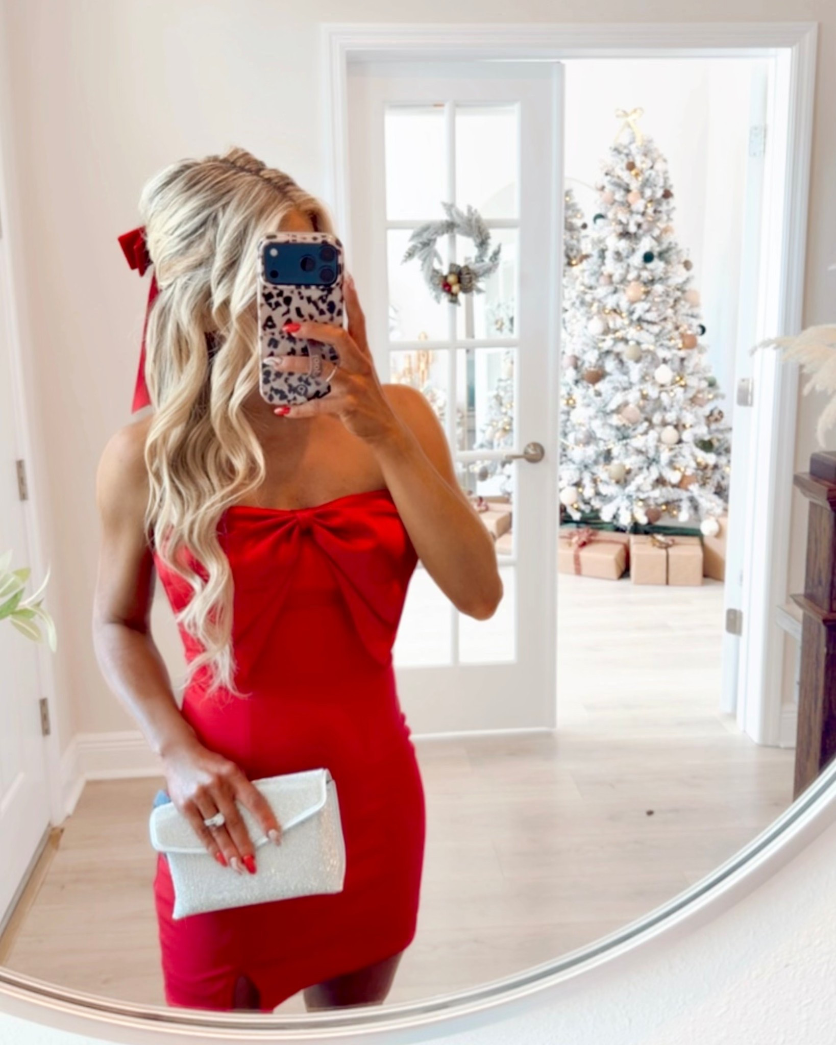 This holiday party dress is perfect for Christmas + holiday parties with its red mini dress fit + satin bow detail! I styled it with a silver rhinestone clutch + sparkly bow heels.

Holiday dress, Christmas dress, Christmas party dress, cocktail dress, red dress, bow dress, holiday heels, special event dress, formal dress, strapless dress

#LTKHoliday #LTKootd #LTKSaleAlert