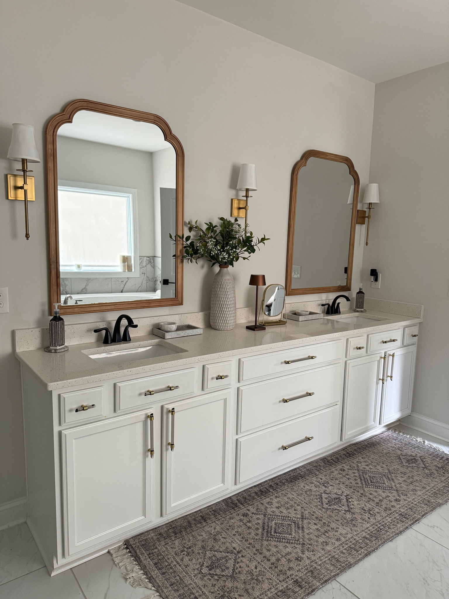Affordable Wayfair finds in my home! Wayfair Labor Day Clearance items in my home! Absolutely love how these sconces add the perfect amount of light above our vanity. The gold finish really compliments the mirror and hardware. You can shop items up to 70% off and get fast shipping!  #wayfair #wayfairfinds #wayfairpartner @wayfair #ad 