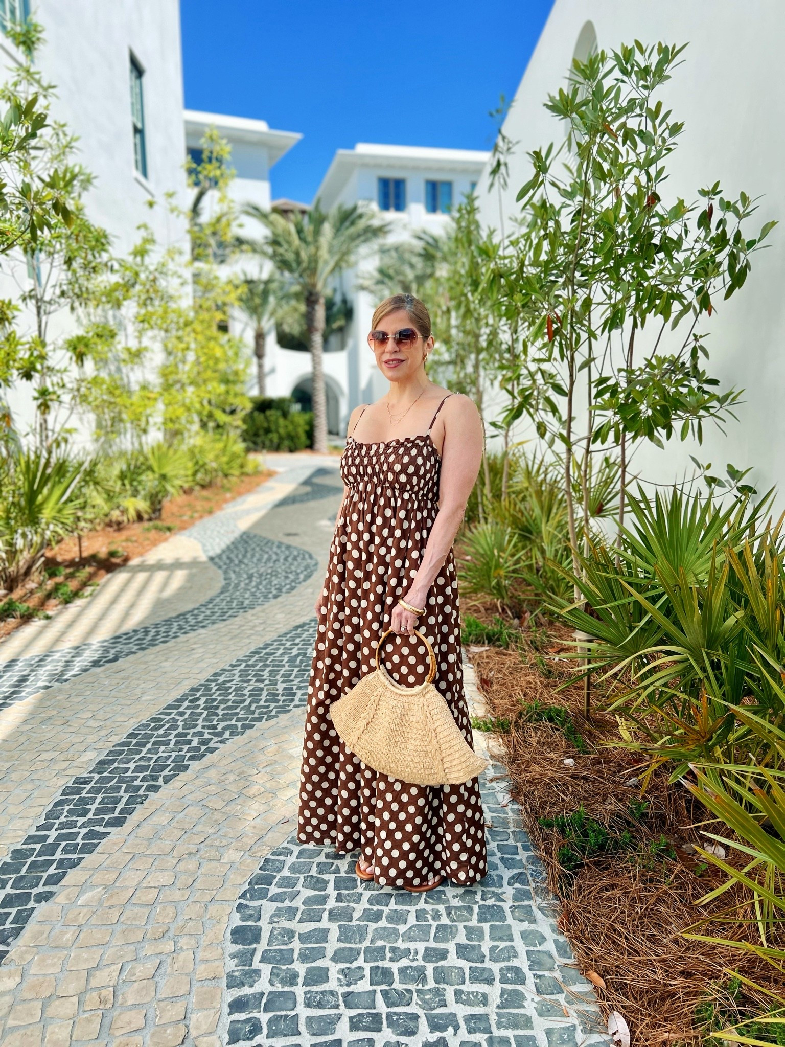 Channeling old Hollywood glamour with a modern summer twist 🤎 Brown polka dot maxi + woven bag = the only vacation formula you need 🌴

#LTKdayinmylife #LTKgrwm #LTKootd