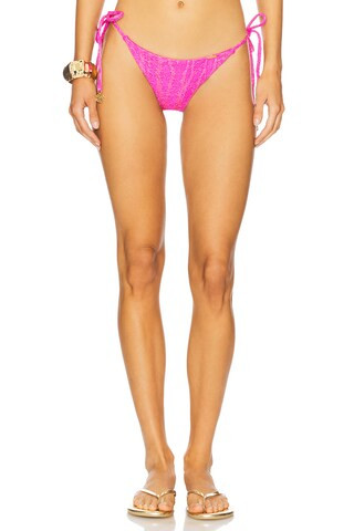 Luli Fama Seamless Ruched Back Brazilian Tie Side Bottom in Fuchsia from Revolve.com | Revolve Clothing (Global)