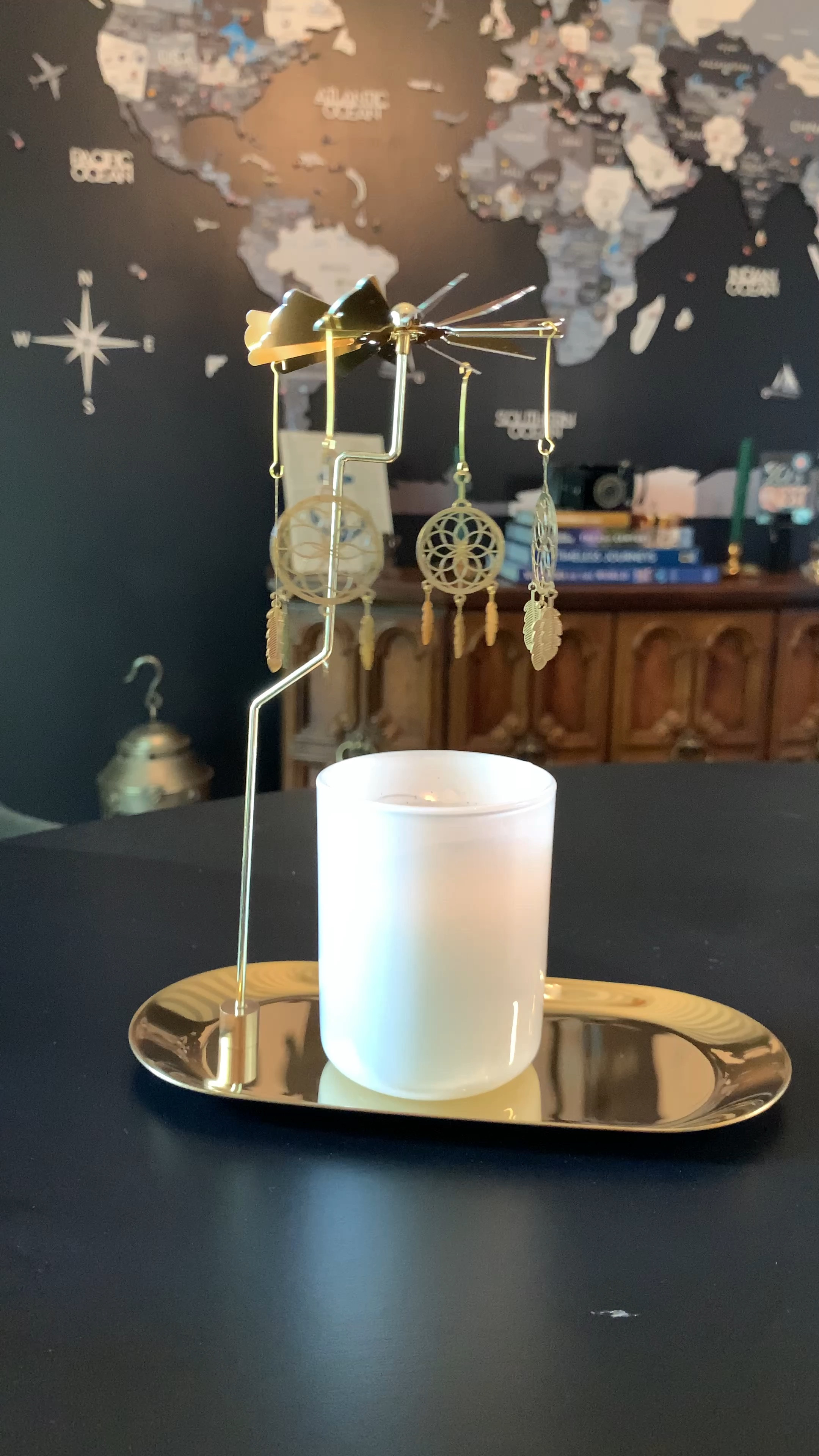 Candle spinner - place a small candle on the tray underneath and the mobile spins 

#LTKhome #LTKHoliday #LTKGiftGuide