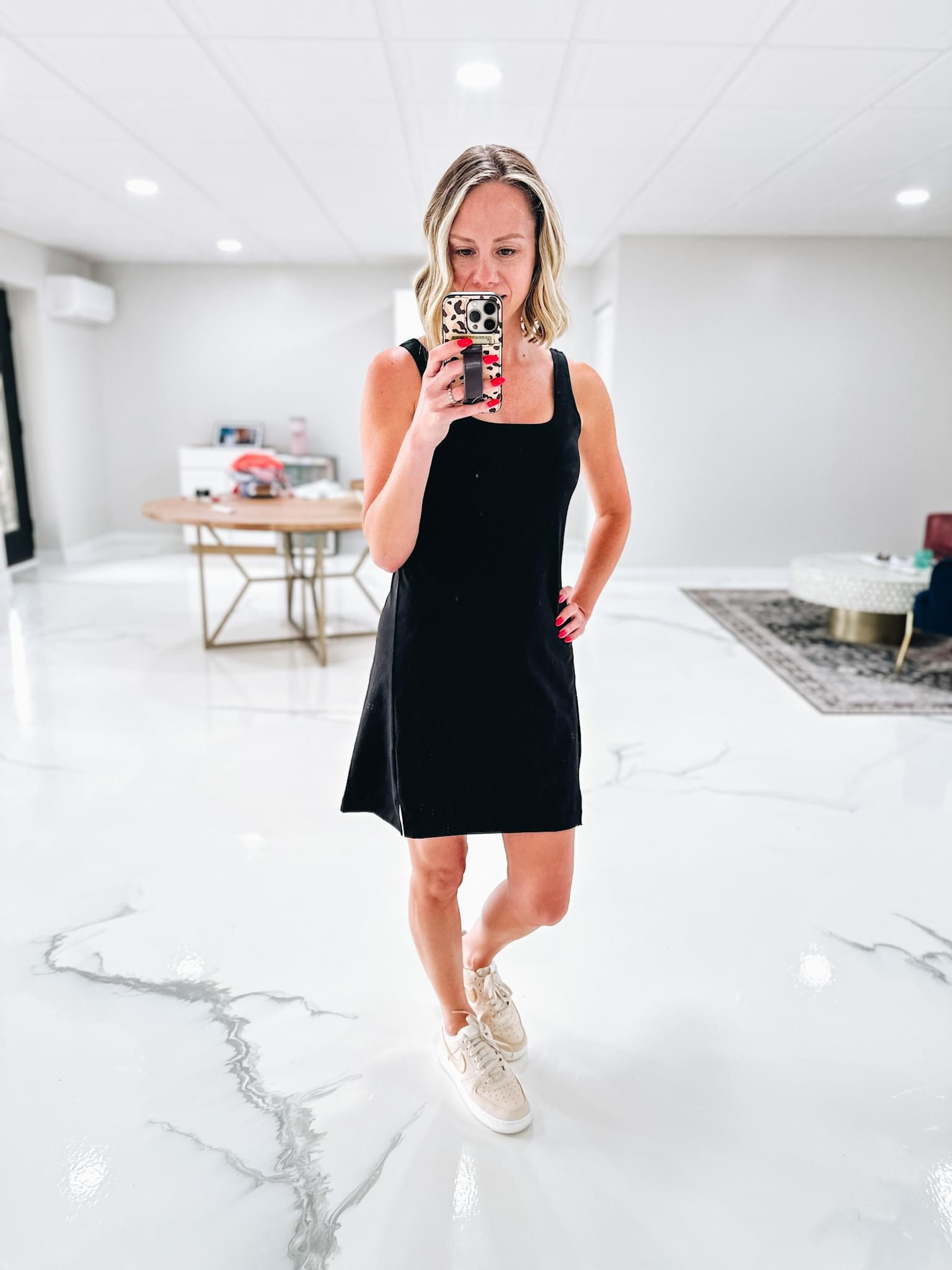 This is so cute for spring! 
Fashionablylatemom 
Old navy dress 
Old navy fashion 
Dick’s Nike shoes 

#LTKshoecrush #LTKstyletip