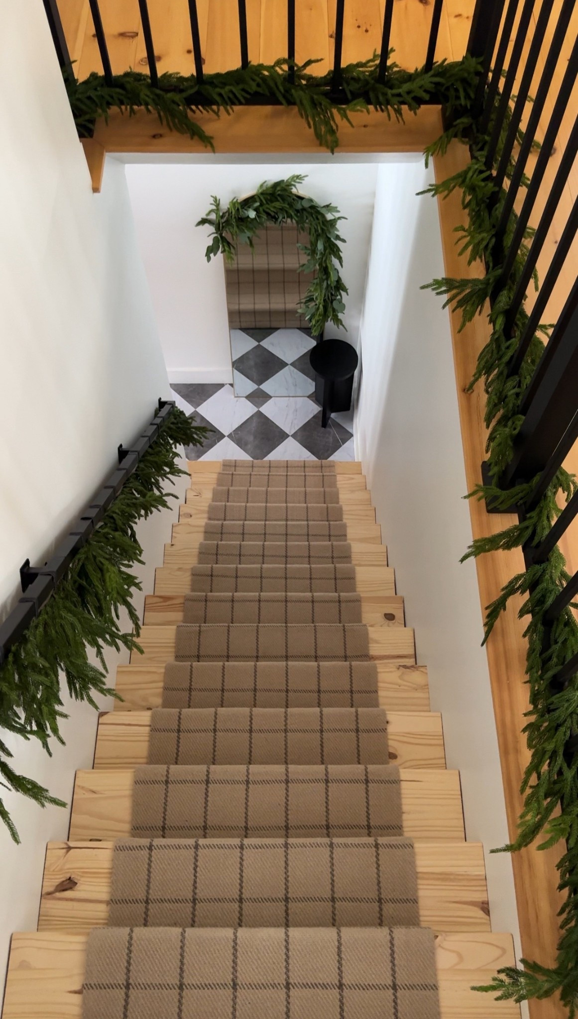 Playing around with the stairway that goes to the playroom — love this garland! 

#LTKHome #LTKHoliday #LTKSeasonal