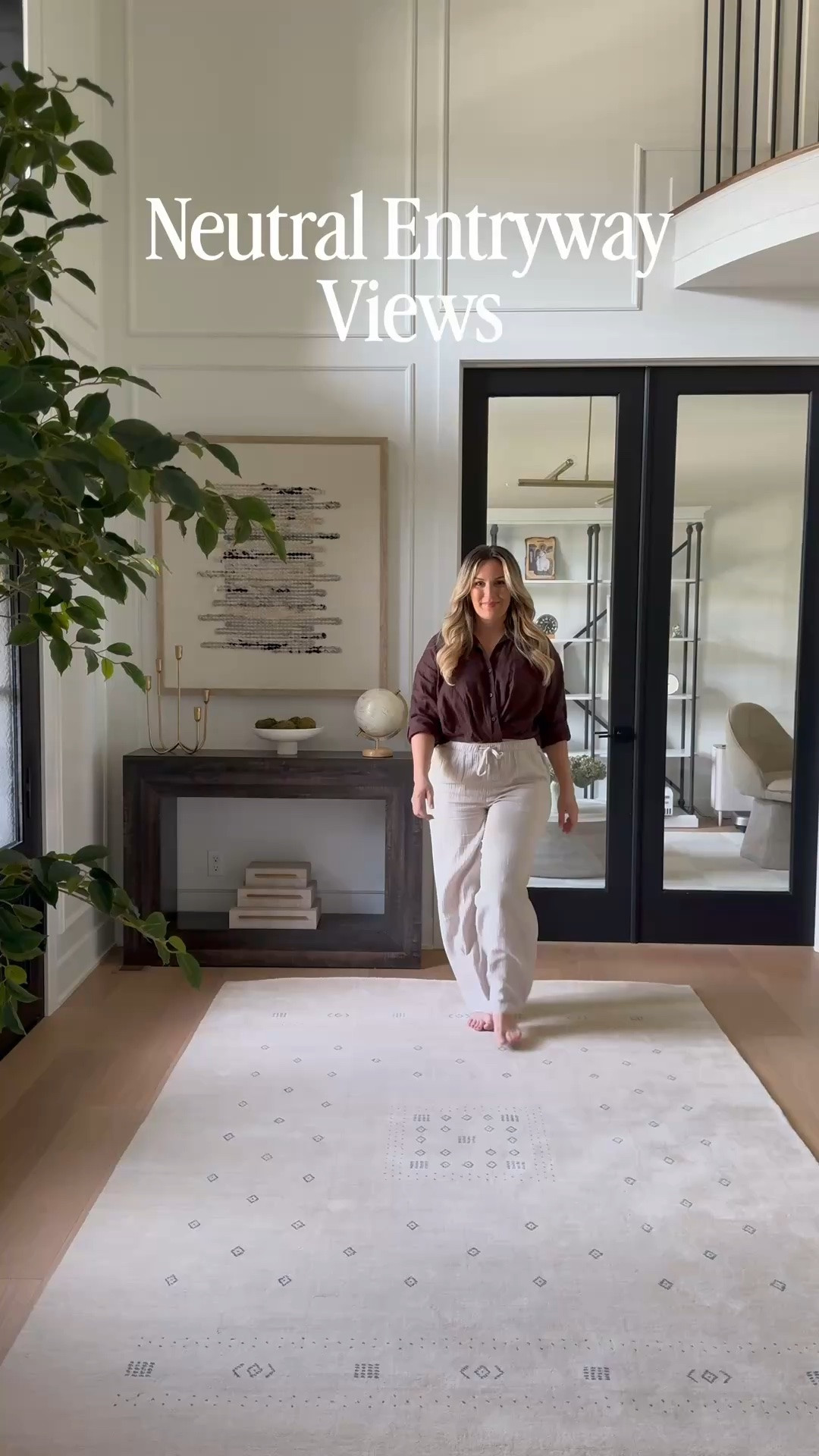 Neutral entryway views. Neutral wool rug, woven wall art, affordable chandelier.

#LTKSaleAlert #LTKHome