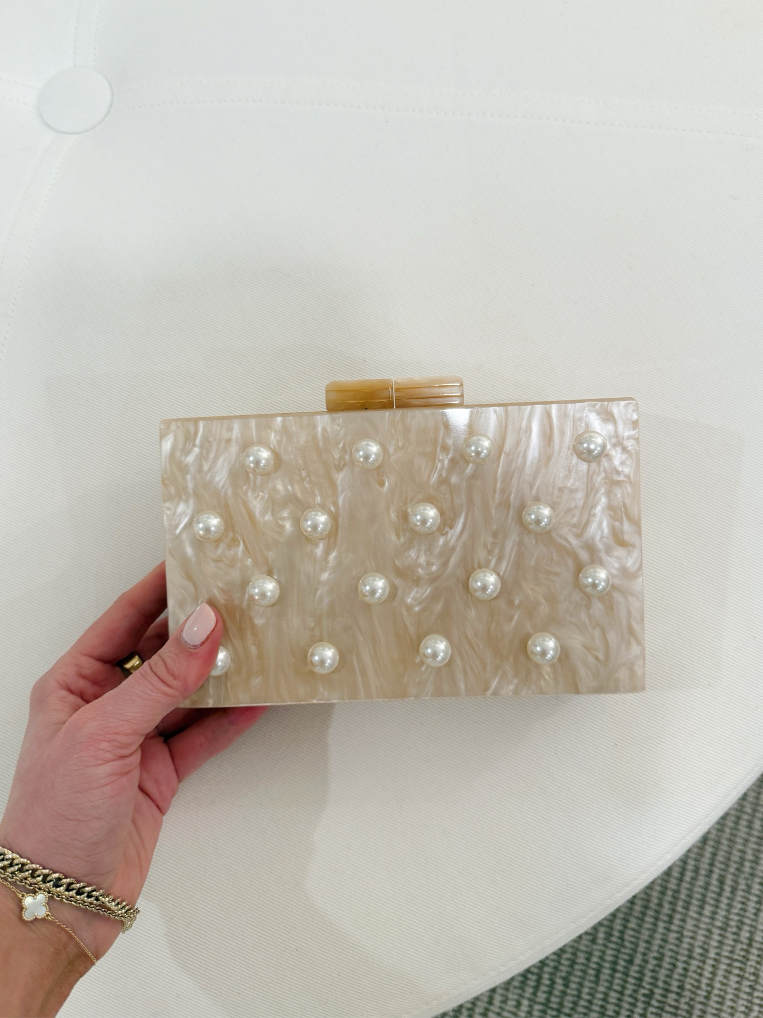 Acrylic Amazon clutch great for a wedding guest look! I love the pearl details!