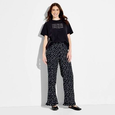 Women's The Devil Wears Prada Graphic Pull-On Pants - Black Polka Dots XXS | Target