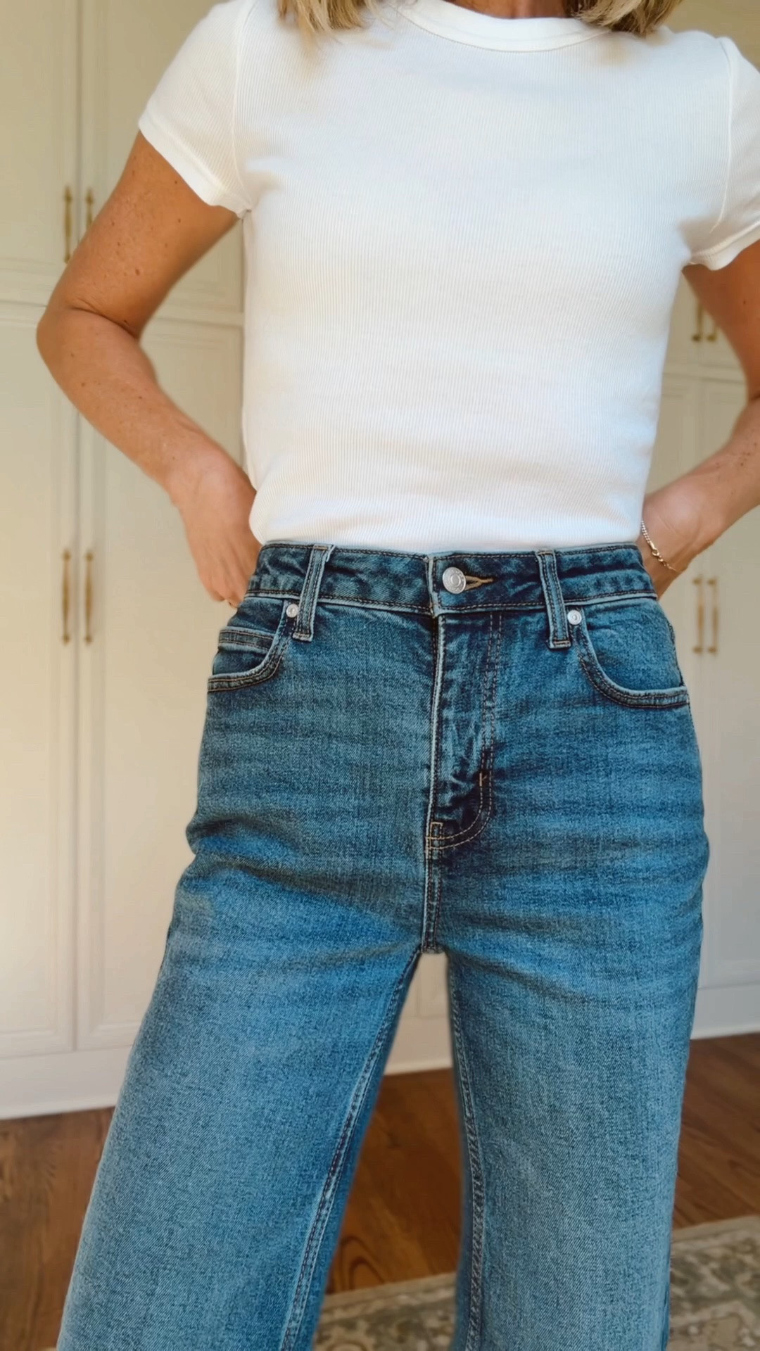 Size 2 in jeans 
Xs in tee and pretty much everything else