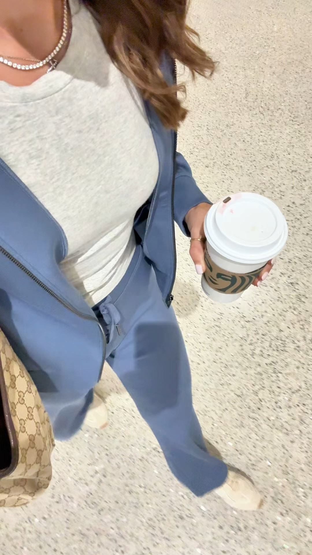My travel outfit of the day. Airport outfit. LISAMARIEXSPANX for 15% off first order & free shipping. The best matching sets for travel! Spanx AirEssentials matching set - XS petite in wide leg pants and XS is jacket. So soft!! Gucci Mercato tote in large. Tory Burch field sneakers - I went up half a size. I love these for travel! 

#LTKootd #LTKTravel #LTKgrwm