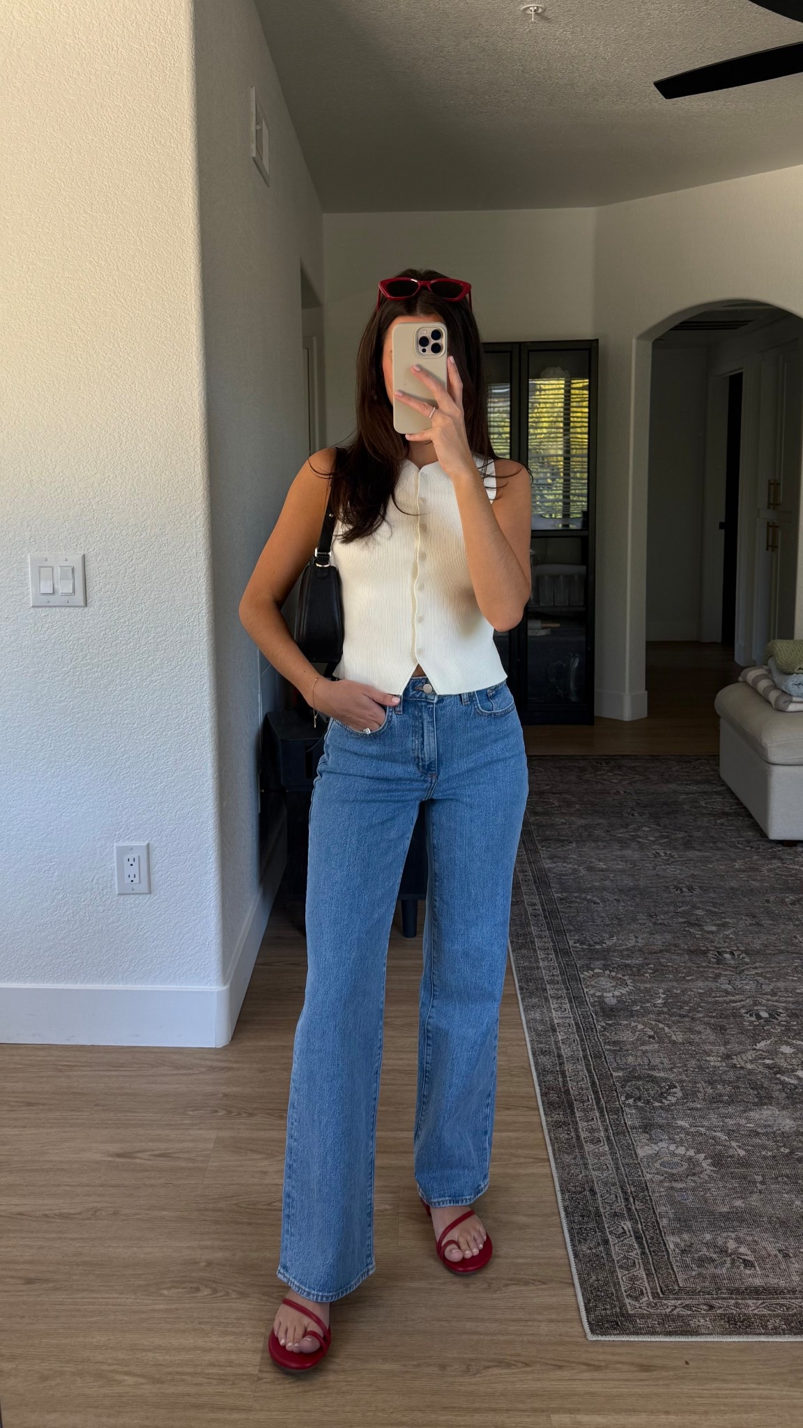 Outfit of the day! I’m wearing my true size 25 in the jeans and a small in the knit vest top! I’m 5’7”  

#LTKSeasonal #LTKStyleTip #LTKFindsUnder100