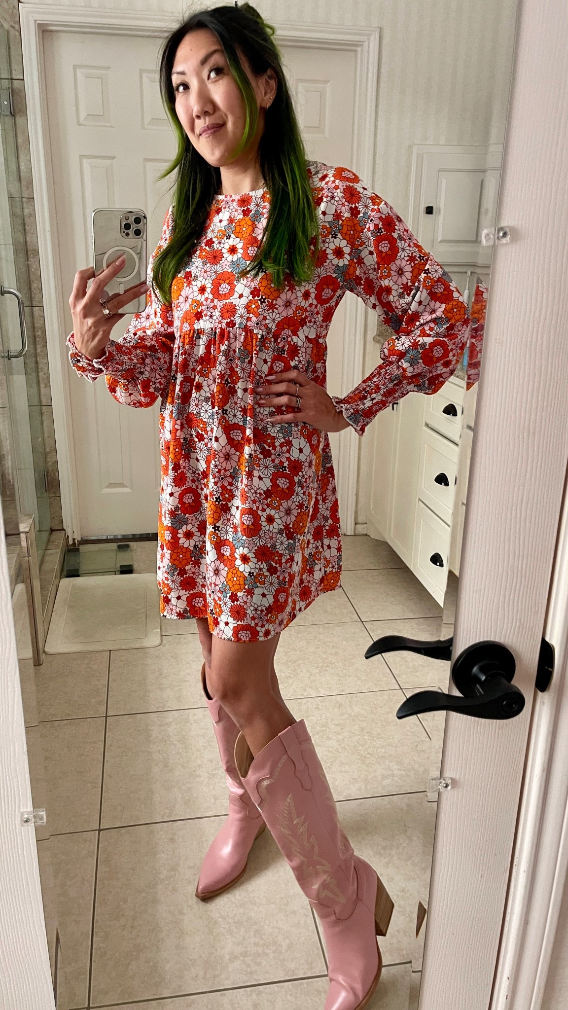 Floral tunic dress and pink cowboy boots
Orange dusty pink white flowers 

#LTKShoeCrush #LTKStyleTip
