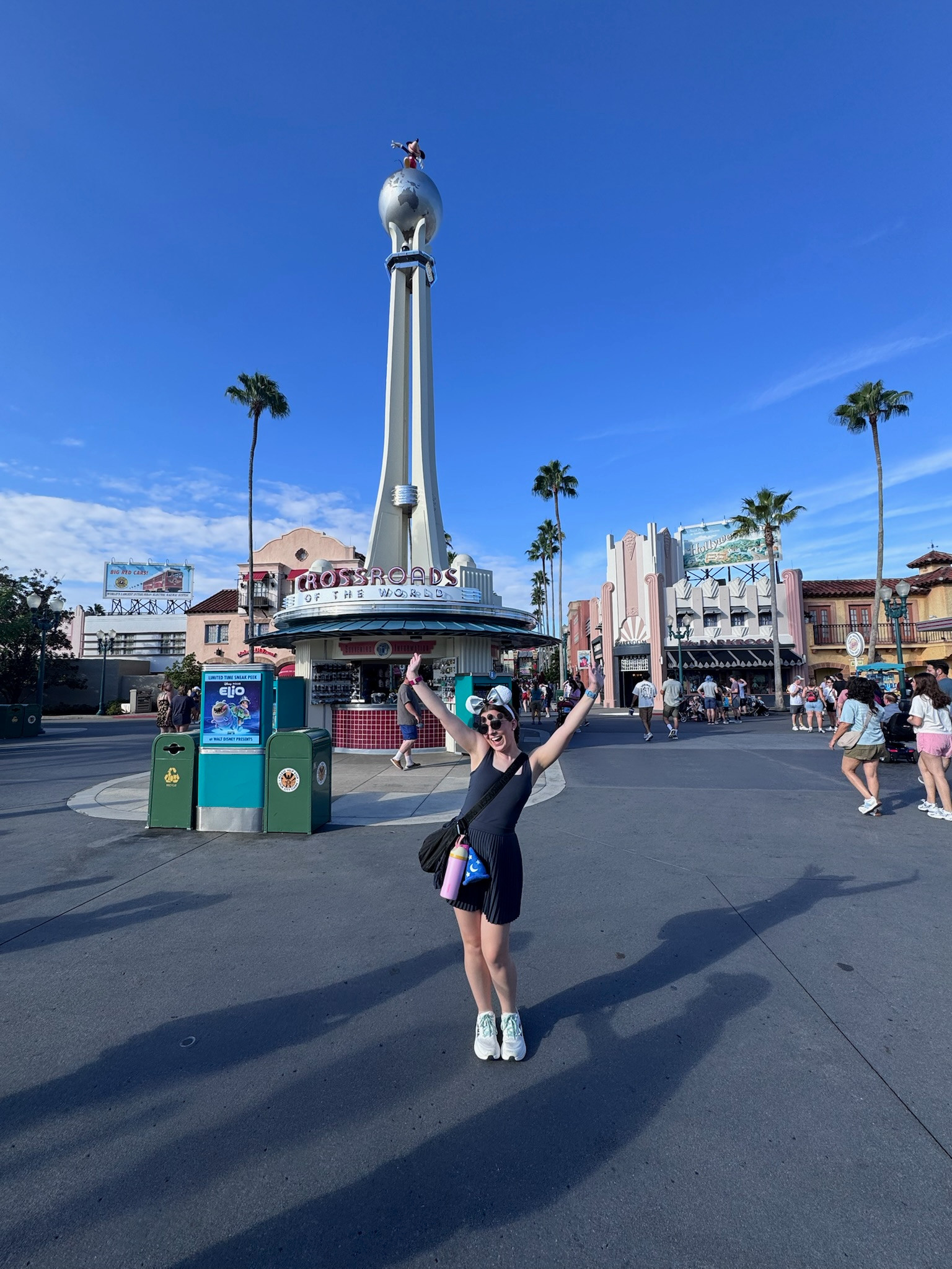 This navy blue pleated athletic dress is one of my favorite Disney park outfits! The ribbed knit fabric is stretchy and comfortable for all-day wear, and the pleated skirt moves beautifully. Paired it with white sneakers for walking and a pink crossbody bag for all my park essentials. The classic black Mickey sunglasses complete the look. This outfit works for parks, Disney Springs, or even date night at a Disney resort restaurant!

#DisneyParkDress #BlackDress #HollywoodStudios #DisneyParkStyle #DisneyOutfit #PleatedDress #DisneyDateNight #DisneyFashion 

 #LTKootd #LTKActive #LTKTravel