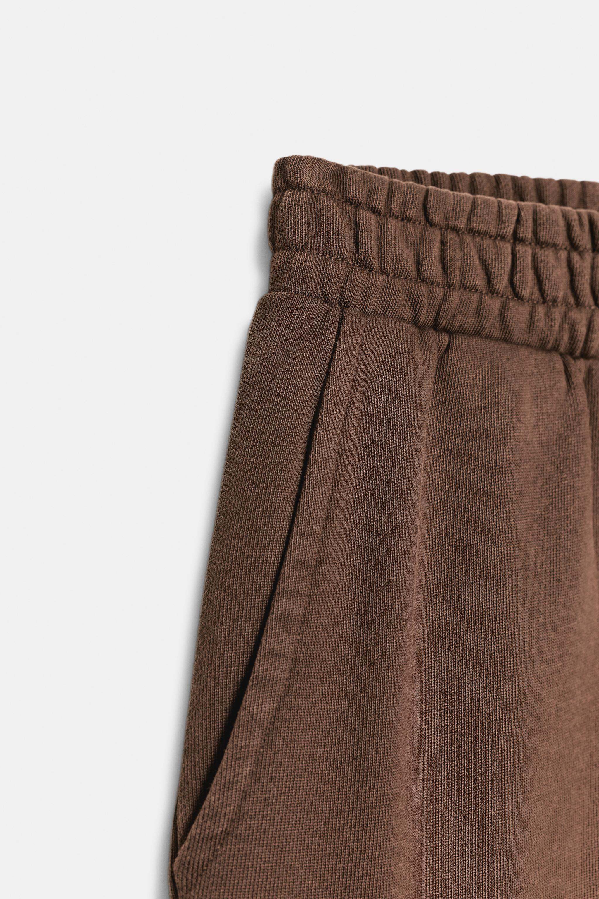 WASHED EFFECT FLEECE PANTS WITH STUDS | Zara US